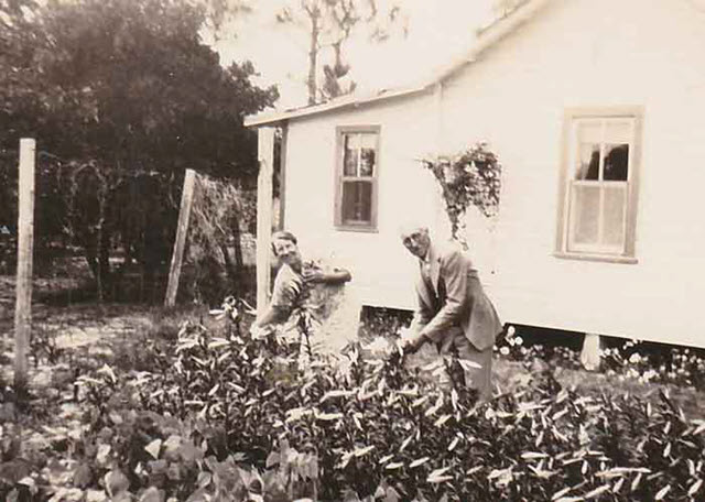 Mabel and Walter G Wood beside their home in Fellsmere FL